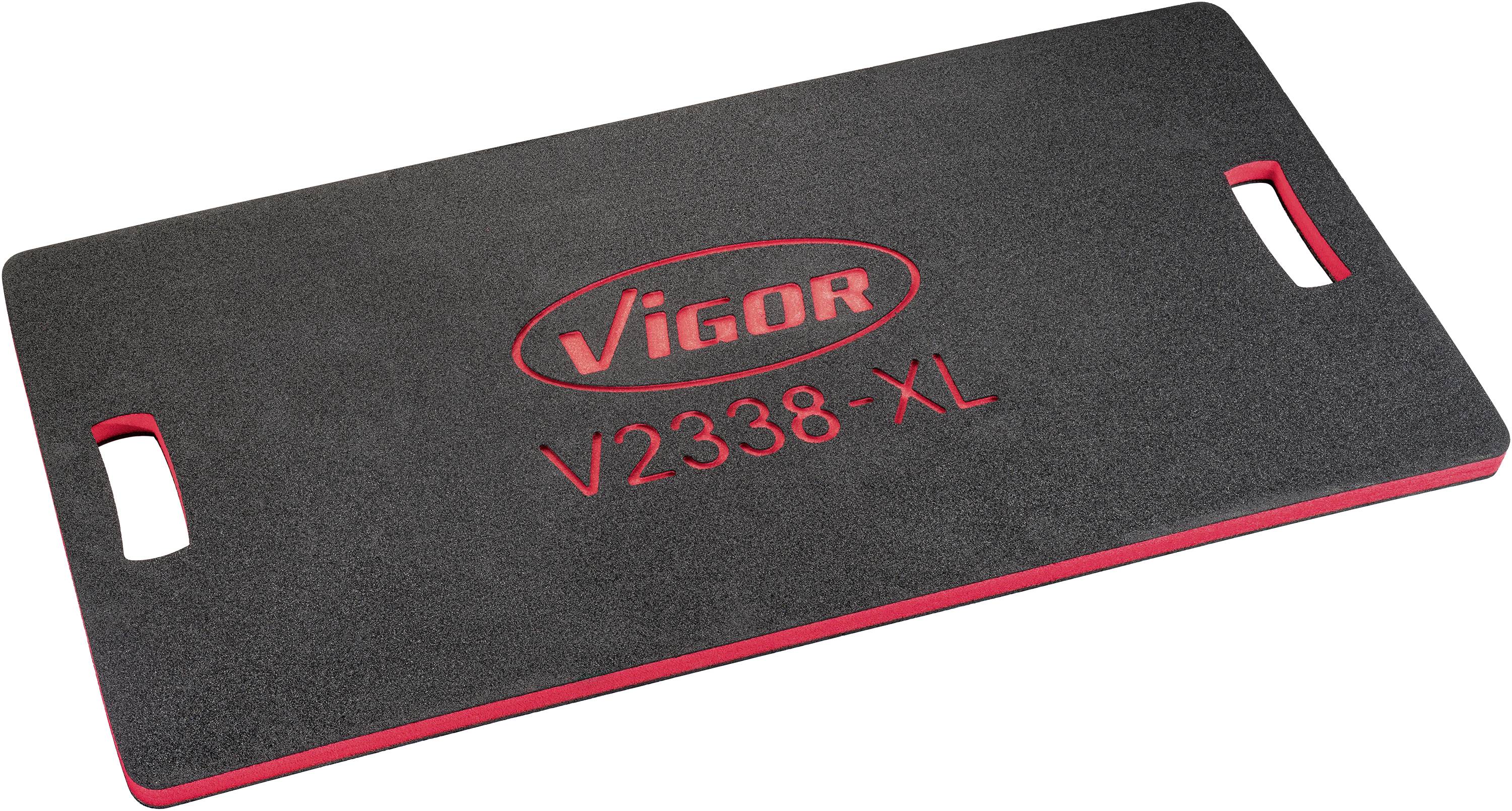 Tapis noir mat avec bordure rouge, portant l'inscription 'Vigor V2338-XL', deux ouvertures de poignée sur les côtés, utilisé comme support de genou.