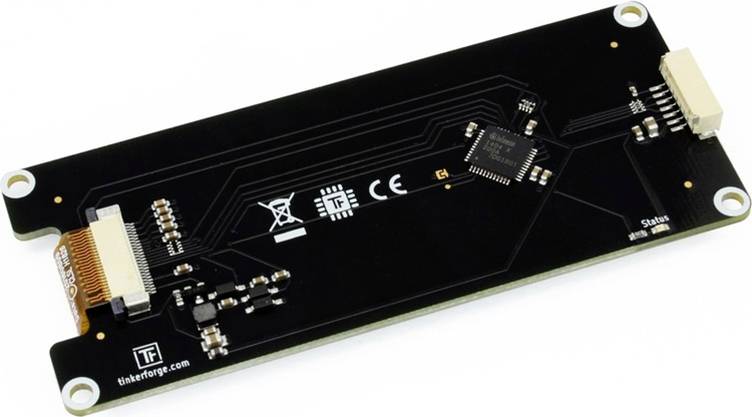 Une carte électronique noire avec différents connecteurs et circuits électroniques. Inscription : 'tinkerforge.com', marquage CE visible.