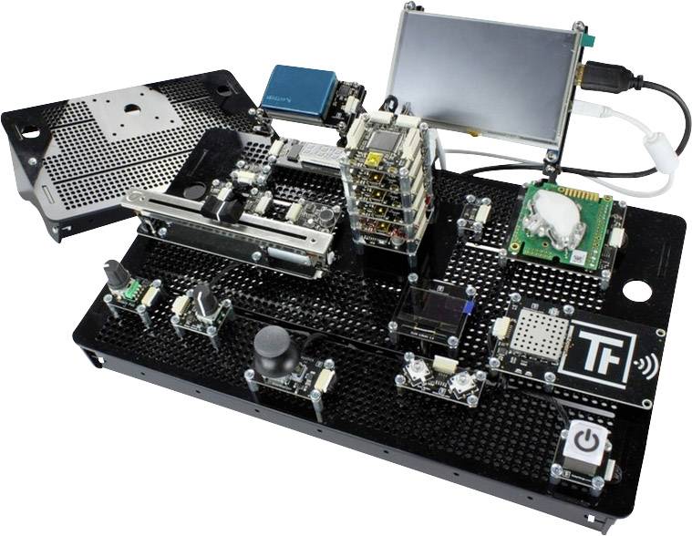 Carte de développement avec plusieurs modules, capteurs et petit écran. Adaptée pour les prototypes en électronique et robotique.