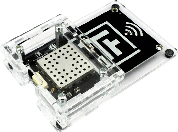 Un boîtier transparent contenant un composant électronique affichant le symbole Wi-Fi et un "T", servant à la communication sans fil.