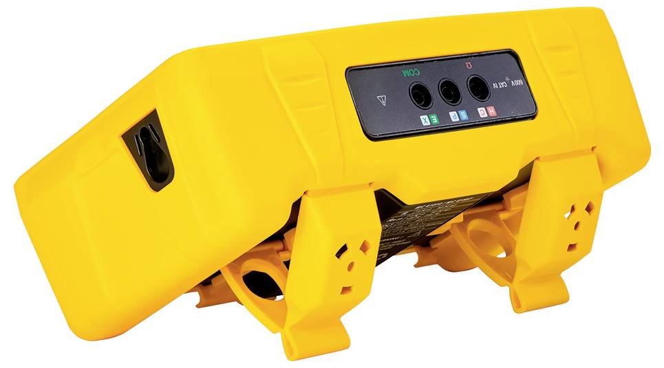 Appareil électronique jaune avec un panneau de commande noir en haut, trois ports de connexion et plusieurs voyants lumineux ; probablement un équipement technique.