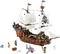 Un bateau de pirates Lego avec des voiles blanches, entouré de figurines Lego en tenue de pirates et d'accessoires ; un jouet de construction amusant.