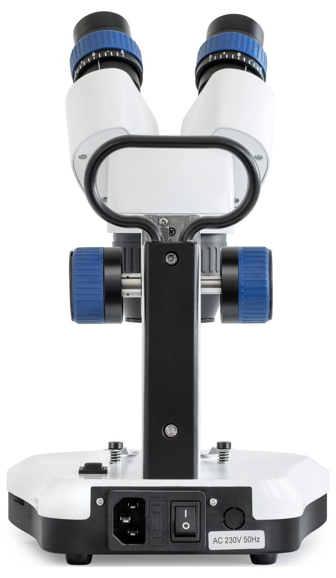 Caméra de microscope vue de dos, montrant deux oculaires et les connexions d'alimentation en bas.