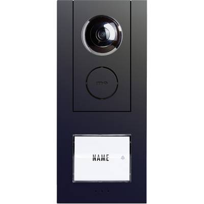 Interphone noir brillant avec caméra et plaque nominative en bas, sur laquelle est inscrit 'NOM'.