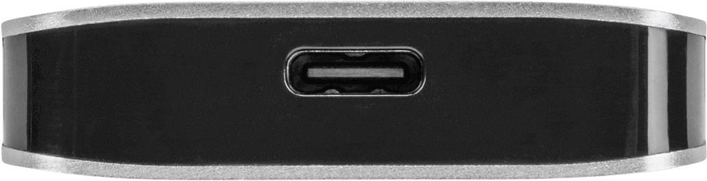 'Un port USB-C au centre d'un appareil noir avec des bords argentés, vu de face.'