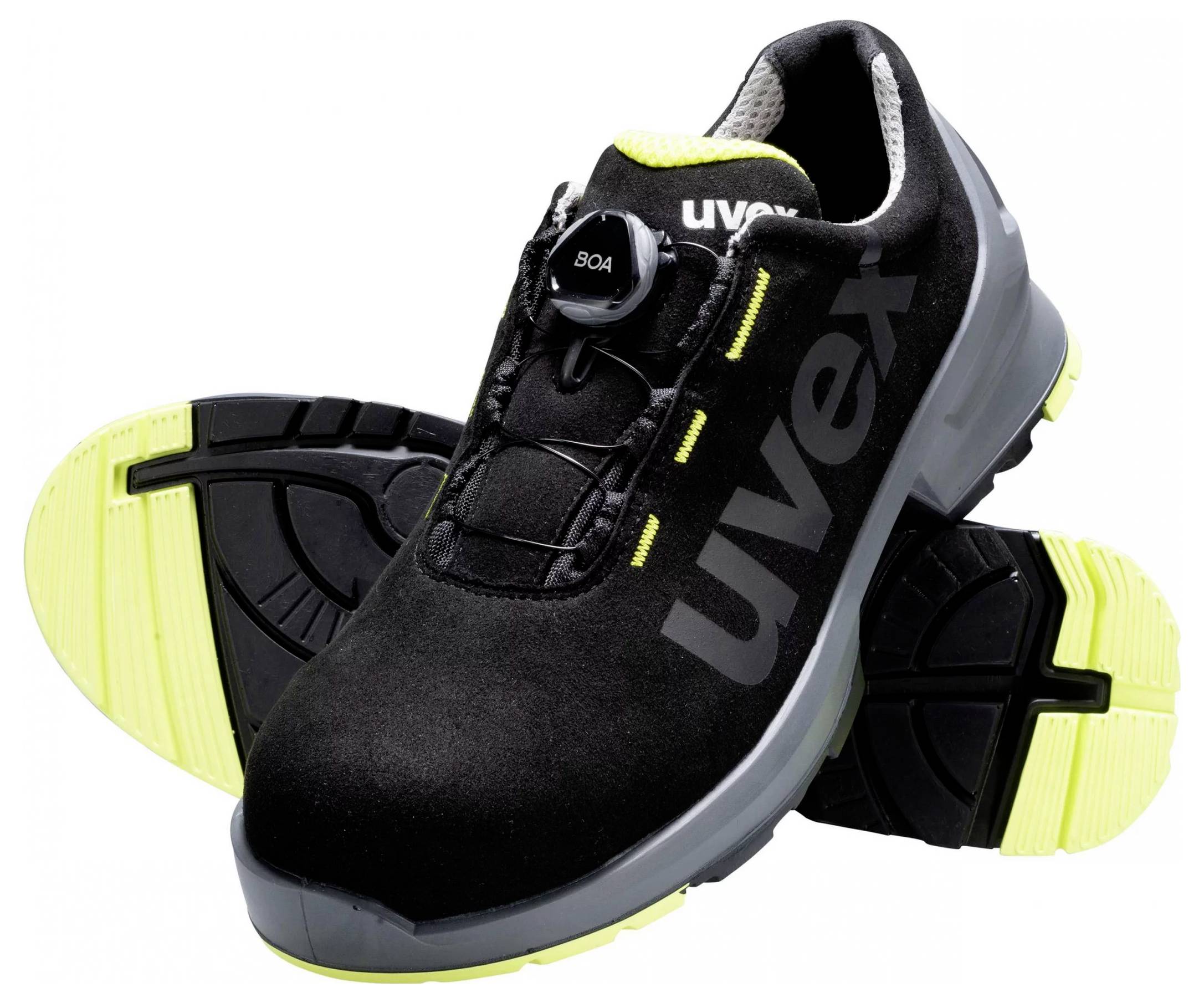 Chaussures de travail noires avec semelle jaune et logo 'Uvex', équipées d'un système de fermeture Boa pour un ajustement rapide.