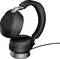 Casque audio noir à fil, porté sur l'oreille.
