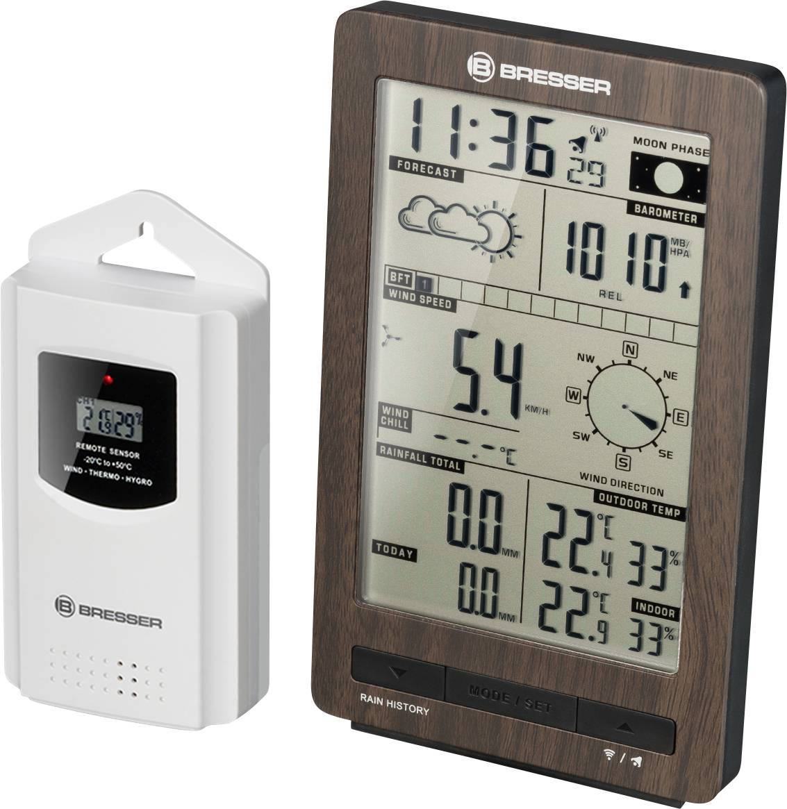 Station météorologique numérique avec capteur extérieur, affiche l'heure, la date, les prévisions météorologiques, la pression atmosphérique, la vitesse du vent et la température.