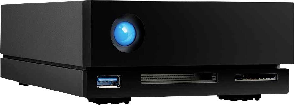 Boîtier de disque dur externe noir avec un bouton bleu lumineux et plusieurs ports sur le devant.