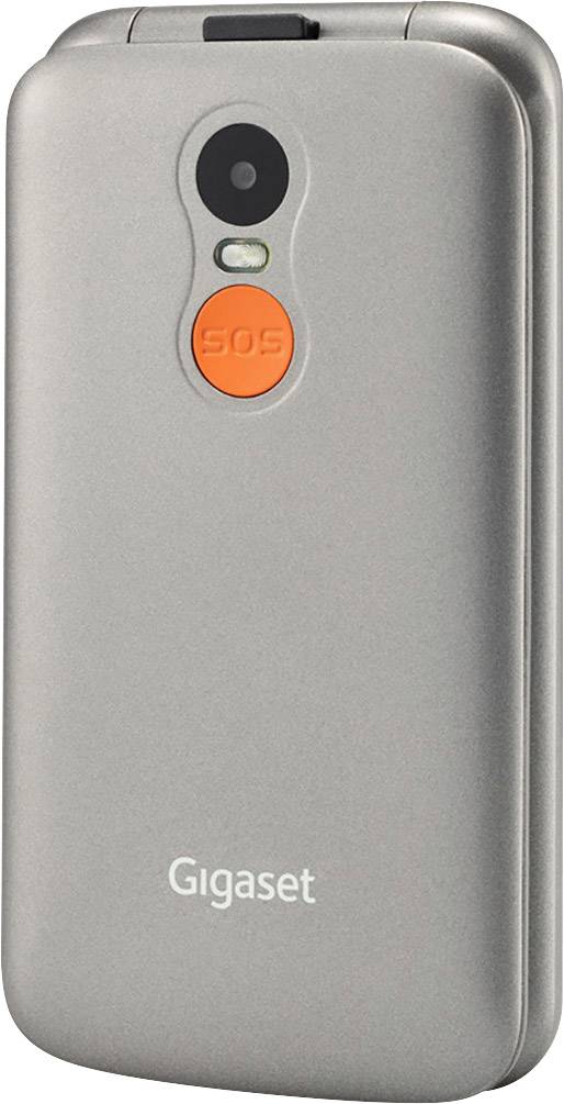 Téléphone mobile à clapet avec ouverture circulaire pour l'appareil photo et bouton SOS bien visible au dos de l'appareil.