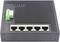 Un commutateur réseau avec cinq ports Ethernet et un connecteur vert pour l'alimentation électrique, portant l'indication 'Power DC 12-48V'.
