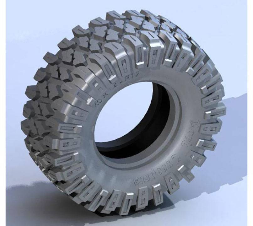 Un pneu robuste et fortement profilé, principalement adapté aux véhicules tout-terrain, avec un profil prononcé pour une meilleure adhérence.