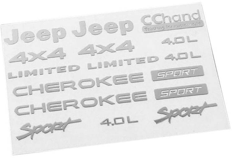 Description d'une plaque d'autocollants avec divers emblèmes de Jeep et de sport, comprenant 'Jeep', '4x4', 'LIMITED', 'CHEROKEE' et 'SPORT'.