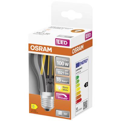 Un emballage d'ampoule Osram. Type : LED, 100W, 1521 lumens, blanc chaud, dimmable, classe d'efficacité énergétique D, durée de vie : 15 ans.