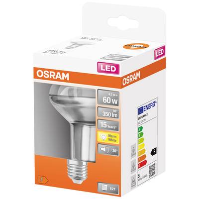Une lampe LED OSRAM dans son emballage. Elle a 60W, 350 lumens, une durée de vie de 15 ans, lumière blanc chaud avec un angle de diffusion de 36°. Classe énergétique F.