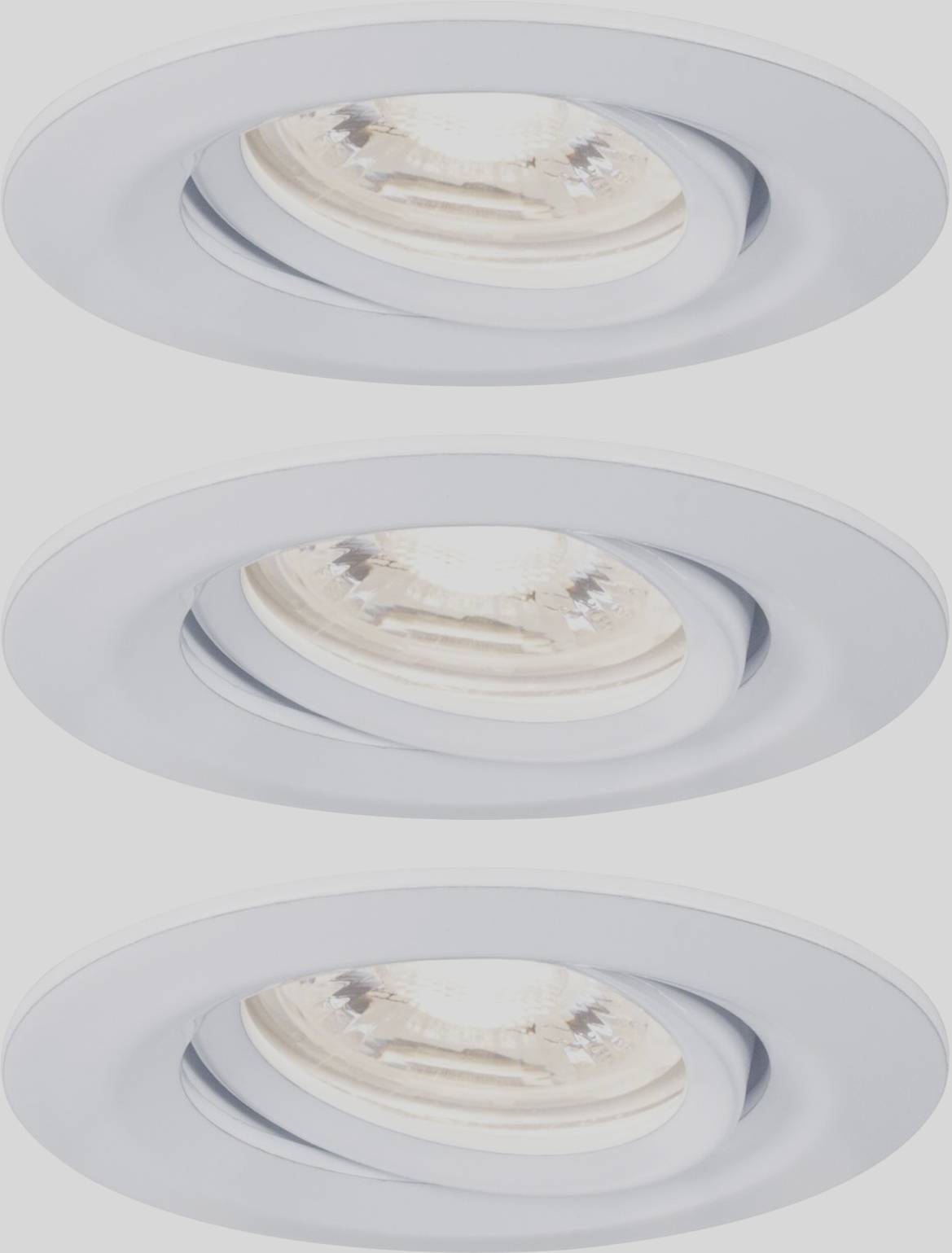 Trois luminaires encastrés ronds au design moderne, disposés en trois rangées verticales. Boîtier blanc, éclairage directionnel, affleurant au plafond.