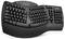 Clavier ergonomique au design incurvé pour améliorer la position de la main. Touches multimédia situées au-dessus des touches standard.
