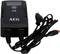 Chargeur de batterie de voiture AEG de 4 ampères. Boîtier noir, deux câbles de connexion, câble secteur avec fiche européenne et interrupteur côté réseau.