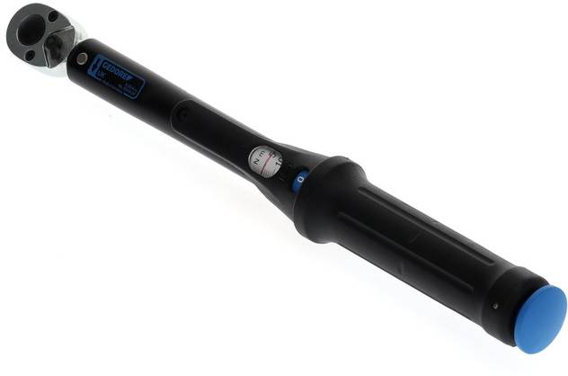 Une clé dynamométrique noire avec un embout bleu et un indicateur de couple sur la poignée.