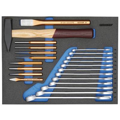 'Ensemble d'outils avec insert en mousse : marteau, burin, pointeau et clés à fourche de différentes tailles, soigneusement rangés.'