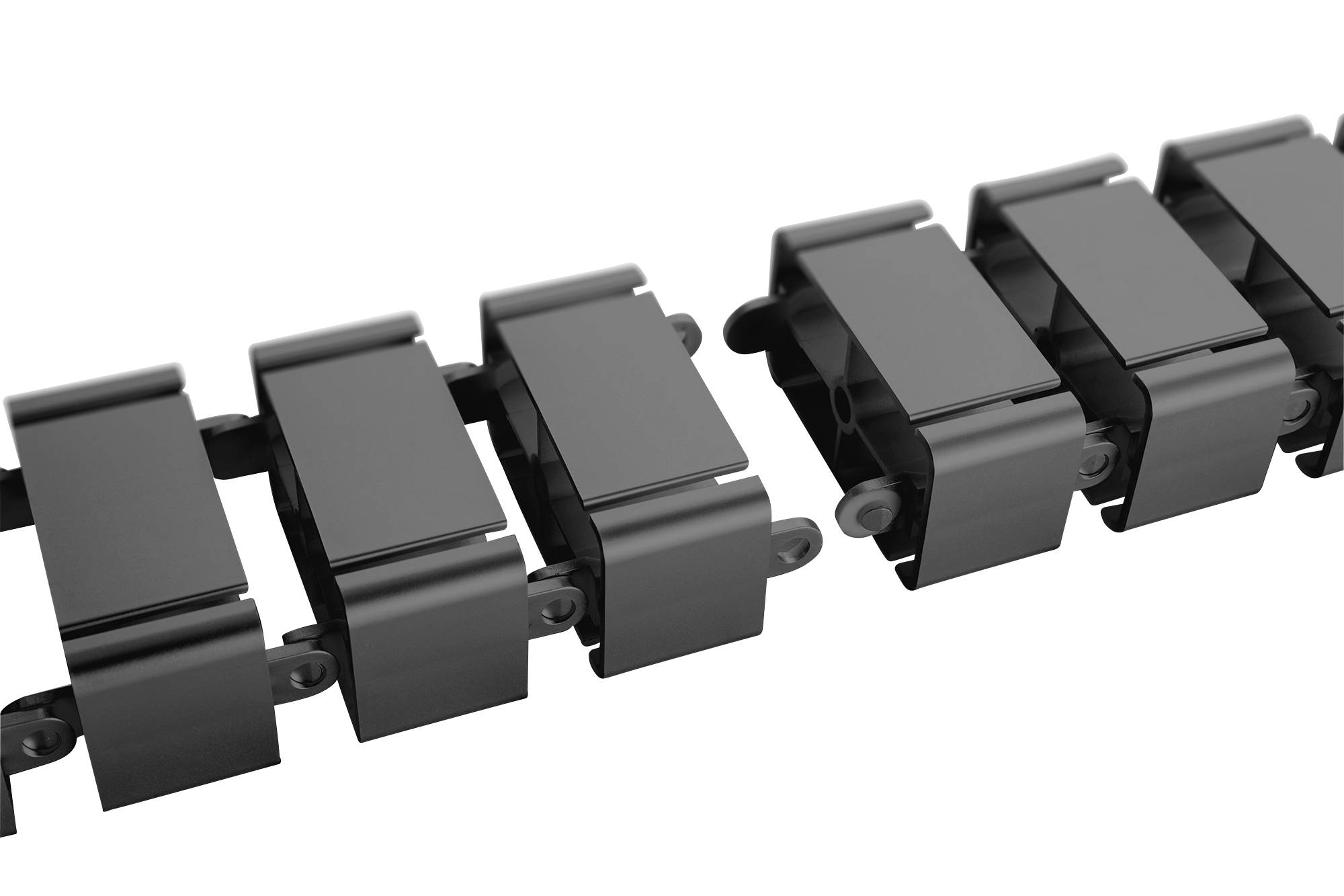 Une rangée de maillons de chaîne noirs interconnectés. Les maillons semblent être faits d'un matériau brillant.