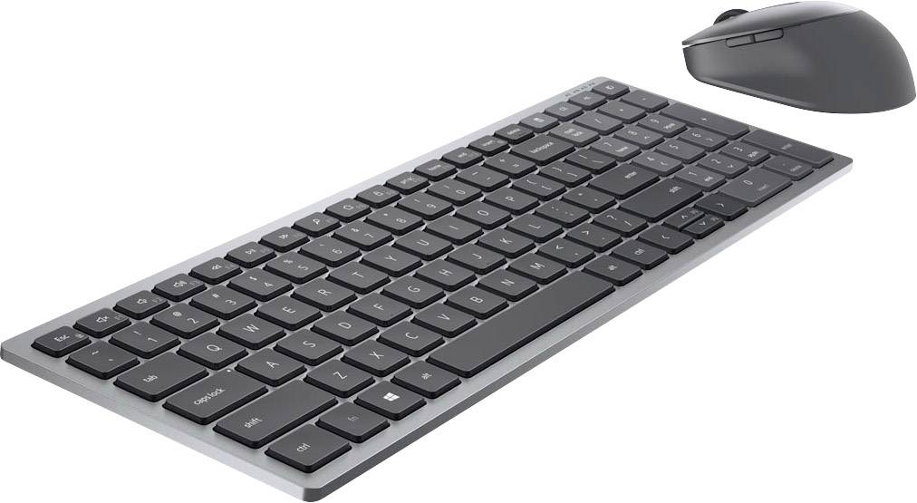 Clavier et souris sans fil noirs, élégants, sur fond blanc ; design minimaliste et moderne.