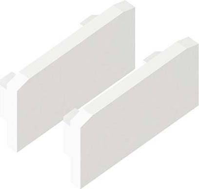 Deux blocs rectangulaires blancs avec de petites protubérances arrondies sur les côtés longitudinaux, parallèles et légèrement décalés l'un par rapport à l'autre.