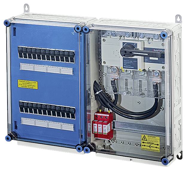 Un boîtier électrique ouvert avec plusieurs rangées de fusibles et des interrupteurs étiquetés pour la régulation et la distribution du courant électrique.