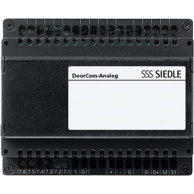 Un dispositif électronique noir portant l'inscription 'DoorCom-Analog SSS SIEDLE', destiné à la communication de porte via des interfaces analogiques.
