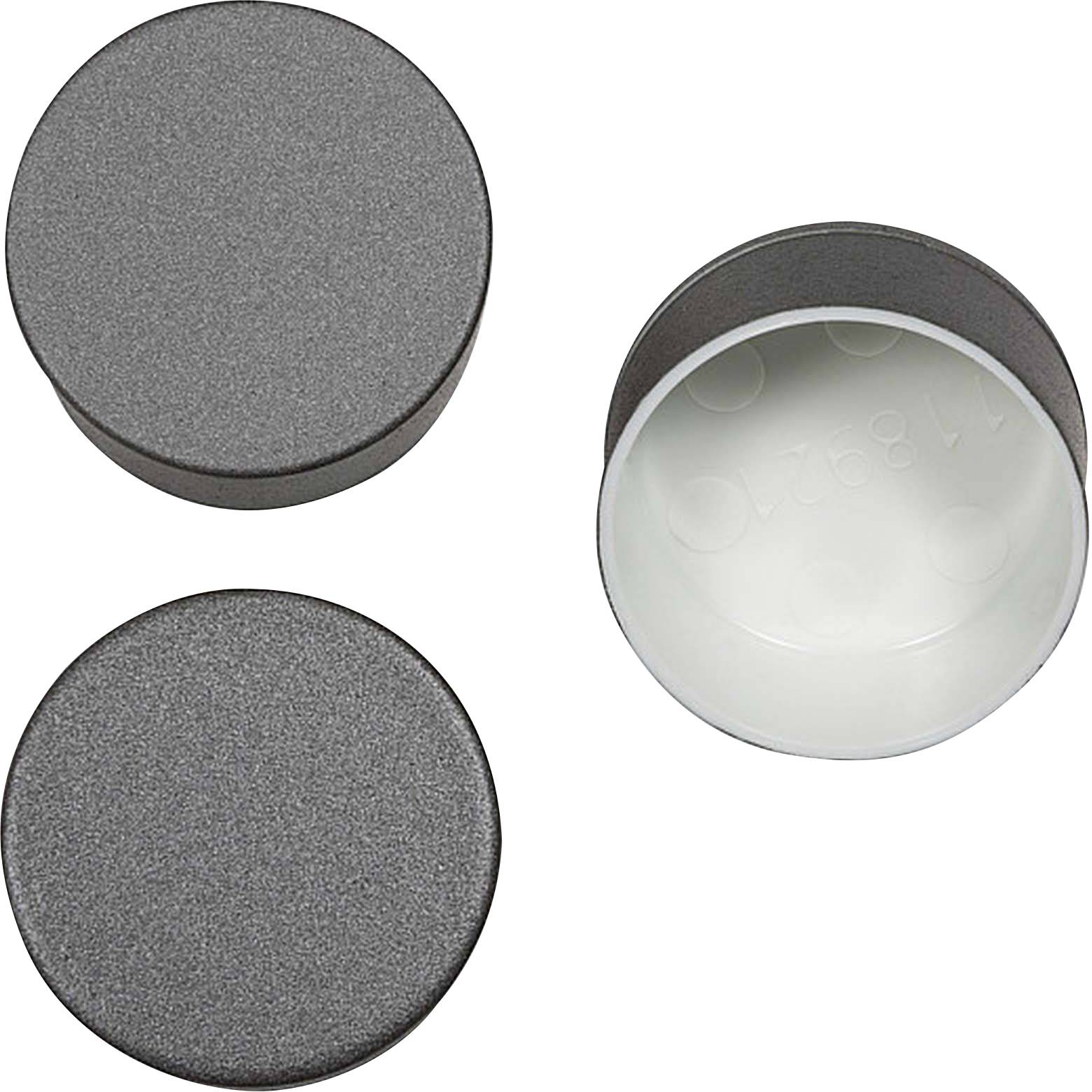 Trois pieds en caoutchouc noir et ronds, dont un montre sa face inférieure avec une surface blanche et un numéro. Ils sont adaptés pour l'amortissement des vibrations.