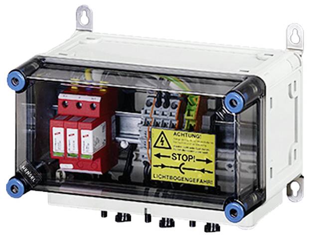 Boîte de distribution électrique avec couvercle transparent, à l'intérieur de laquelle se trouvent des composants électriques et un avertissement jaune « Attention ! Stop ! Danger d'arc électrique ».
