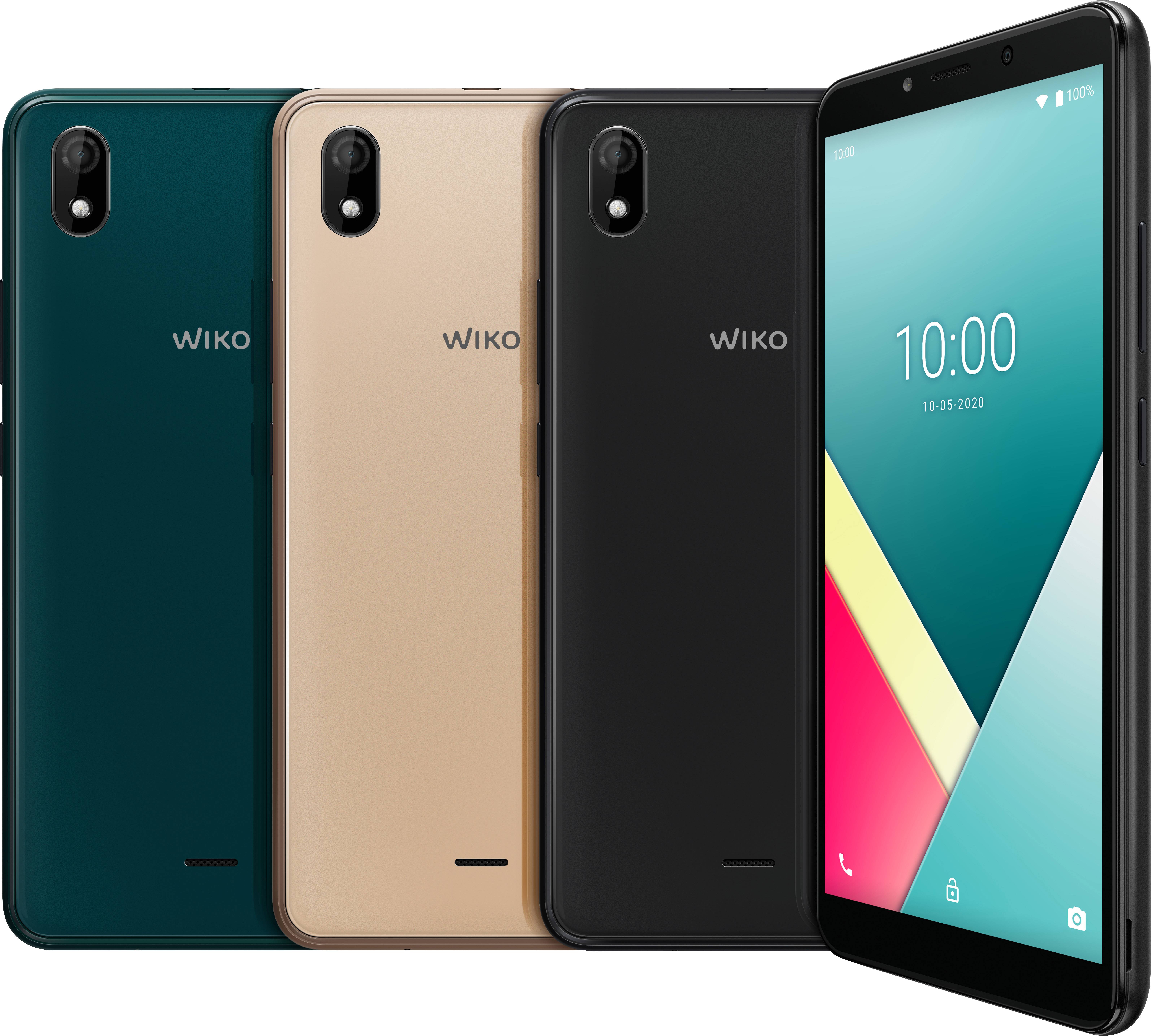Trois smartphones Wiko de différentes couleurs (vert, or, noir) côte à côte, face avant et arrière visibles.