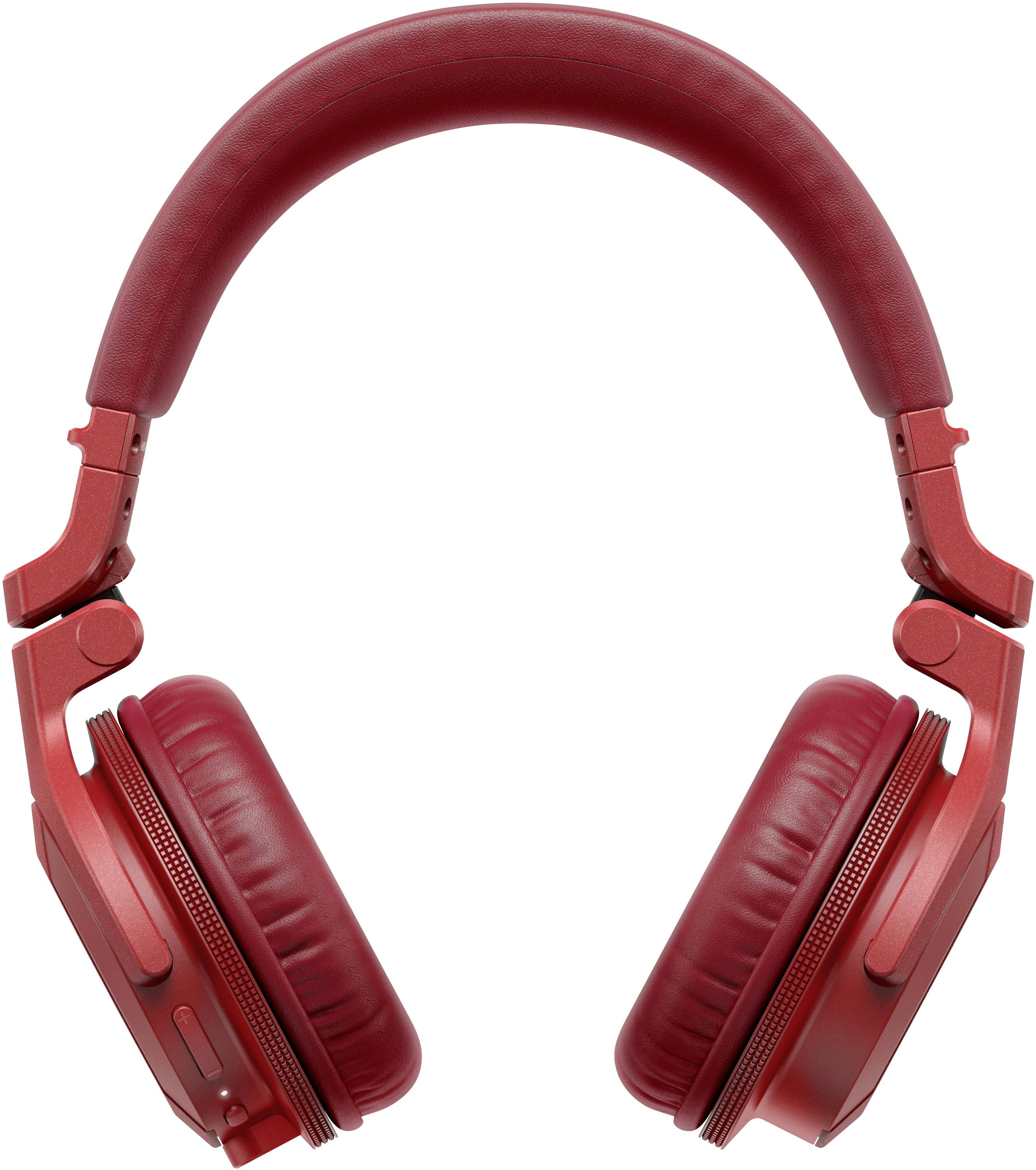 Casque audio rouge sans fil, de type circumaural, avec coussinets d'oreille rembourrés et arceau réglable ; idéal pour profiter de musique en déplacement.