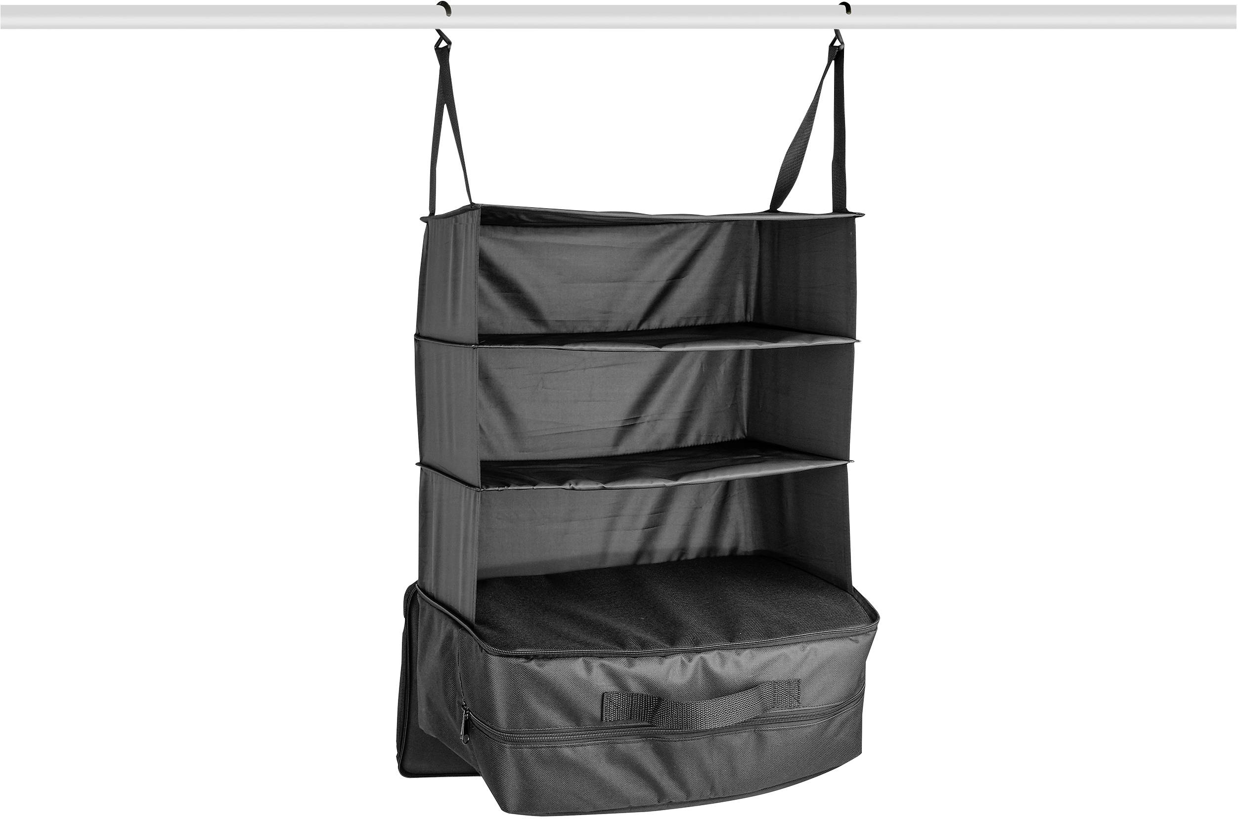 Étagère suspendue avec quatre compartiments de rangement en tissu noir et une poche zippée inférieure. Adaptée au rangement des vêtements.