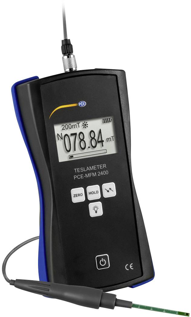 Un appareil de mesure portable affiche '078,84 mT' sur son écran. Il s'agit d'un teslamètre utilisé pour mesurer la densité de flux magnétique avec un capteur connecté.