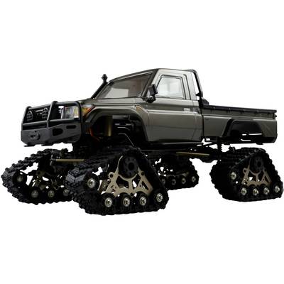 Voiture télécommandée tout-terrain avec châssis à chenilles robuste et carrosserie grise, conçue pour des terrains difficiles. Idéale pour les passionnés de modélisme.