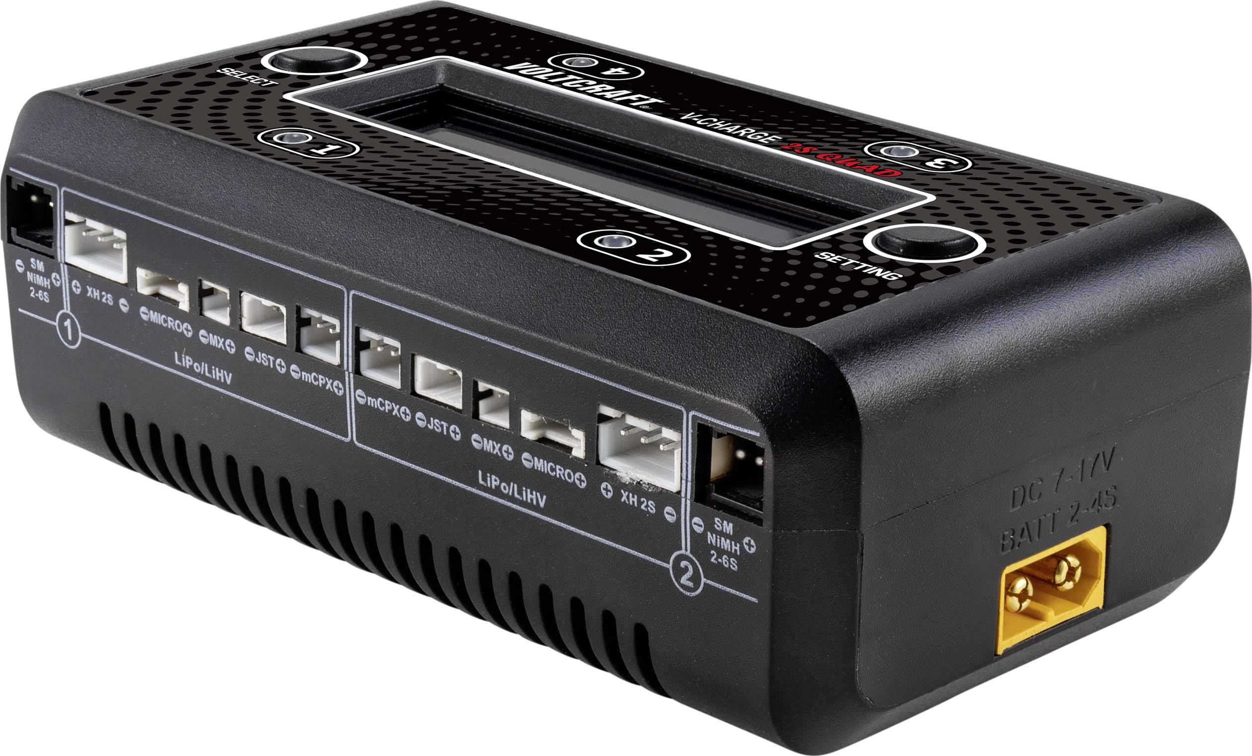 Un chargeur noir avec plusieurs ports pour différents types de batteries. À gauche se trouvent les ports, à droite un écran.