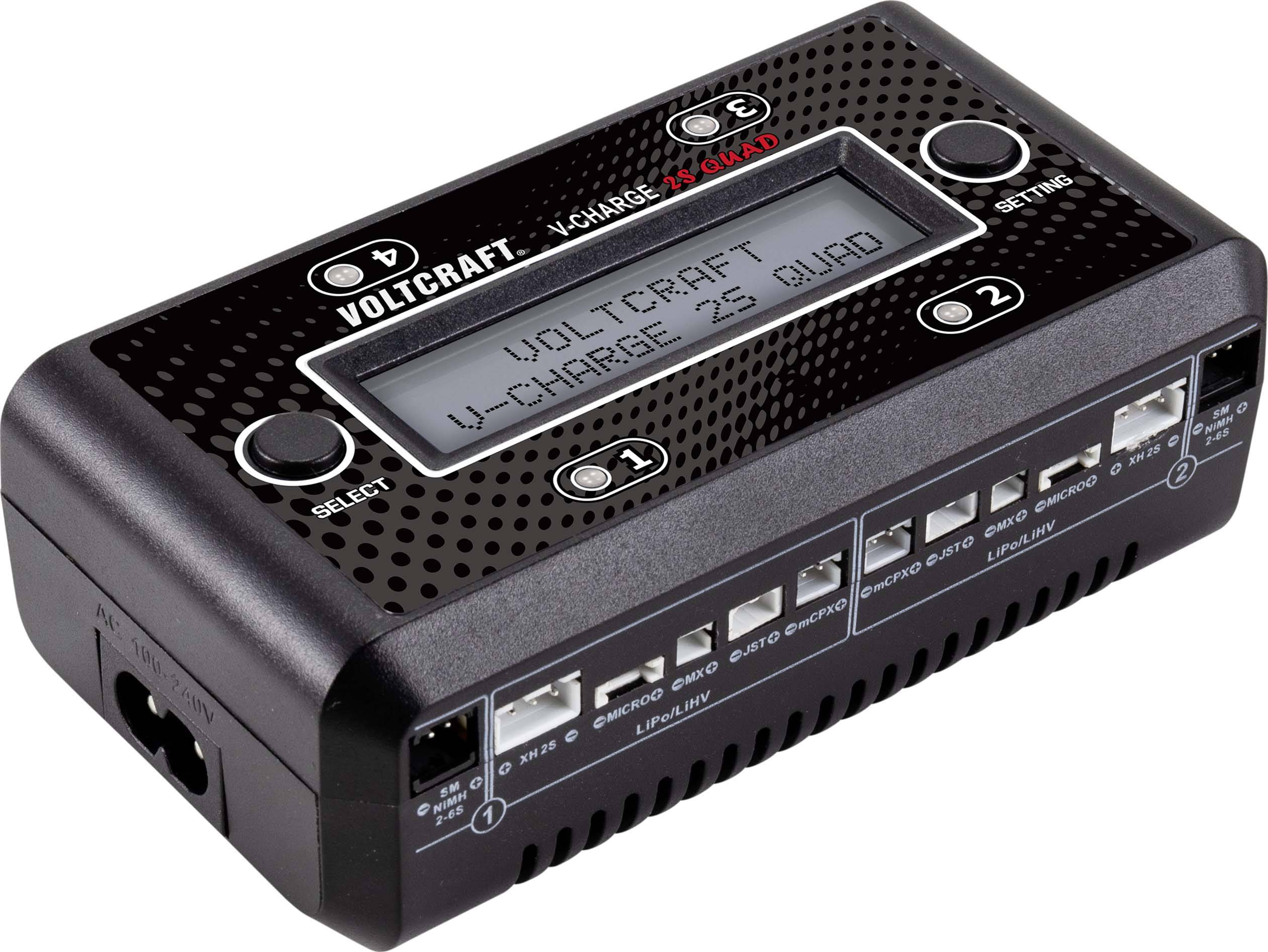Un chargeur électronique de Voltcraft avec un écran affichant 'U-CHARGE X4 QUAD'. Il dispose de plusieurs possibilités de connexion.