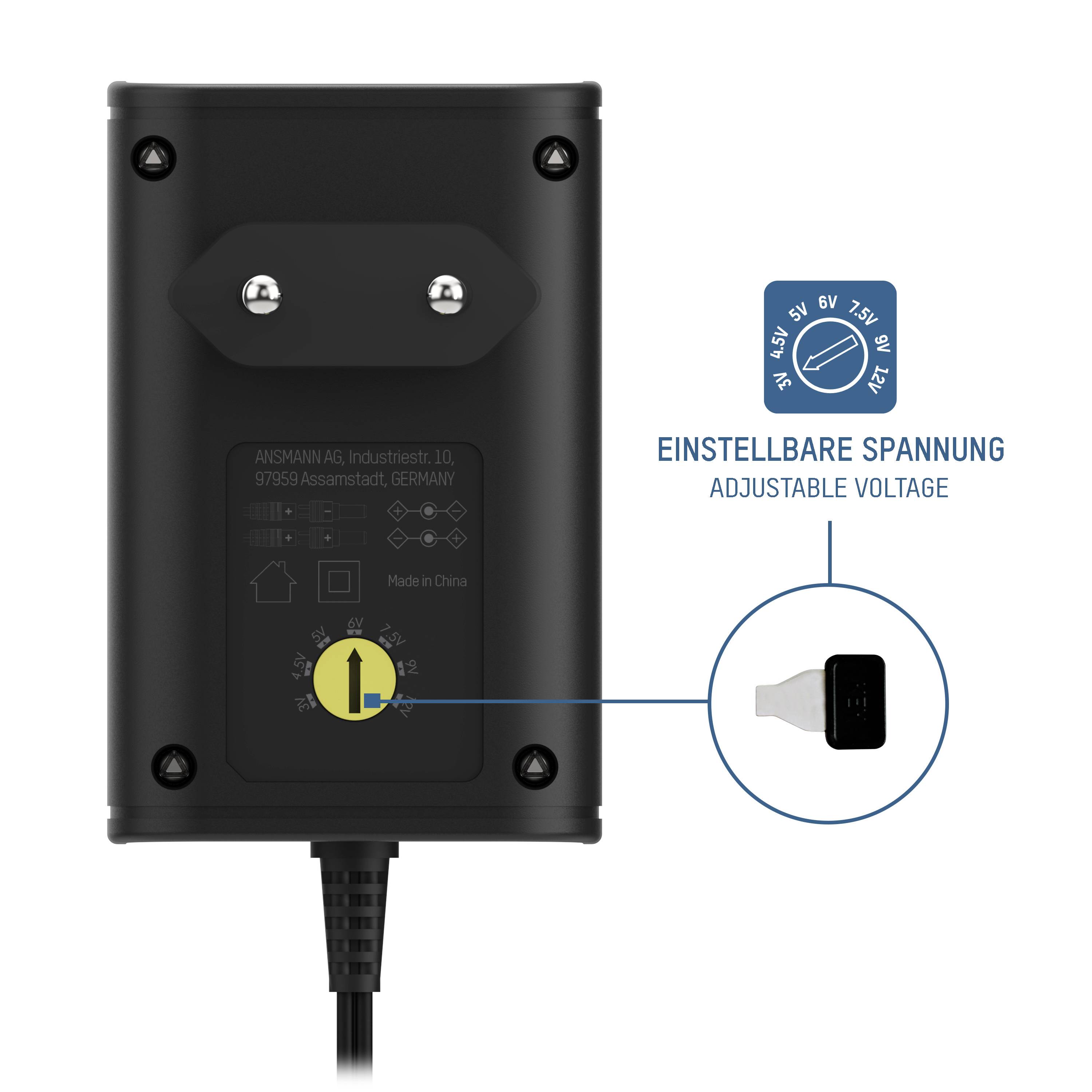 Chargeur avec des symboles pour l'ajustement de la tension. Texte sur l'appareil : 'Tension réglable'. Boîtier noir avec entrée de câble en bas.