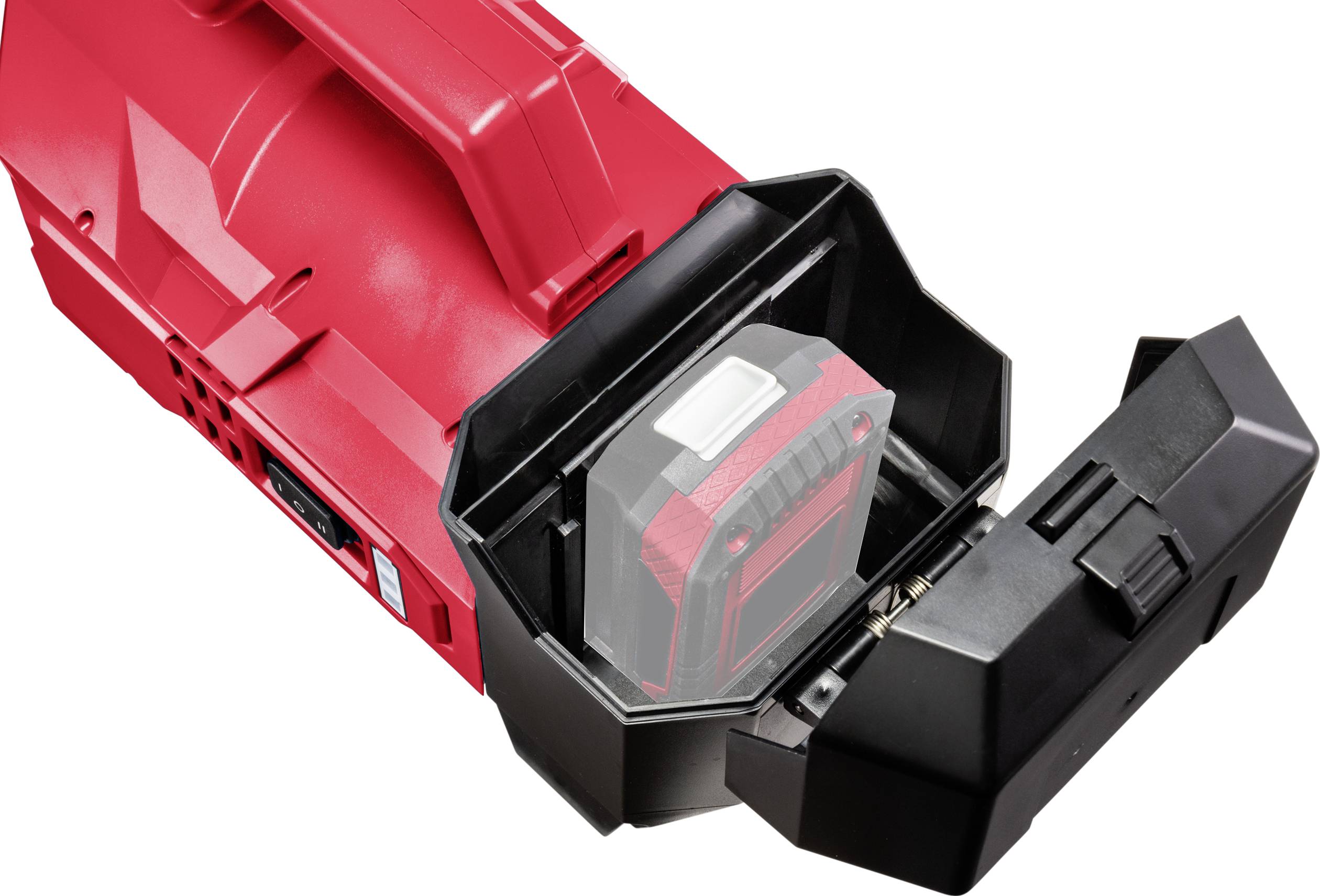 Boîte à outils rouge avec le couvercle ouvert montrant un pack de batterie inséré.