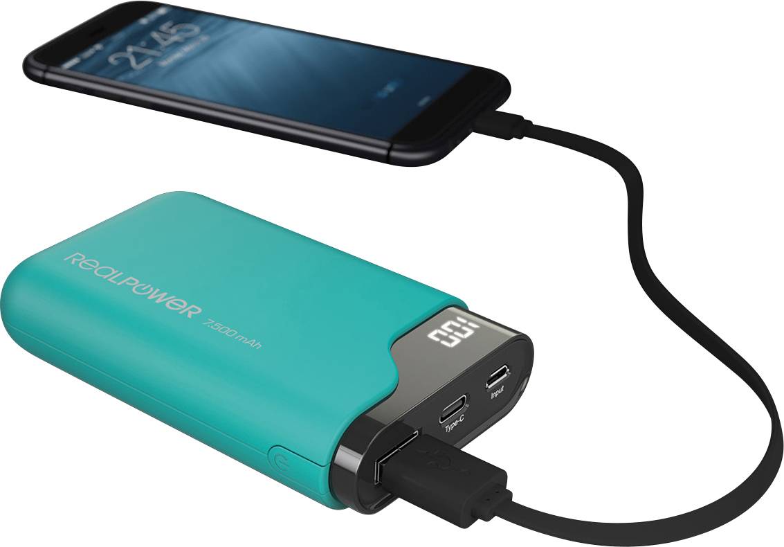 Un smartphone est chargé via un câble USB sur une batterie externe portable. La batterie externe affiche un écran numérique.