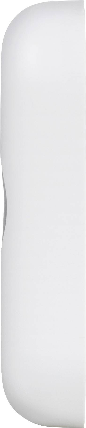 Un objet blanc, lisse, allongé avec des bords arrondis, dont la fonction est inconnue.