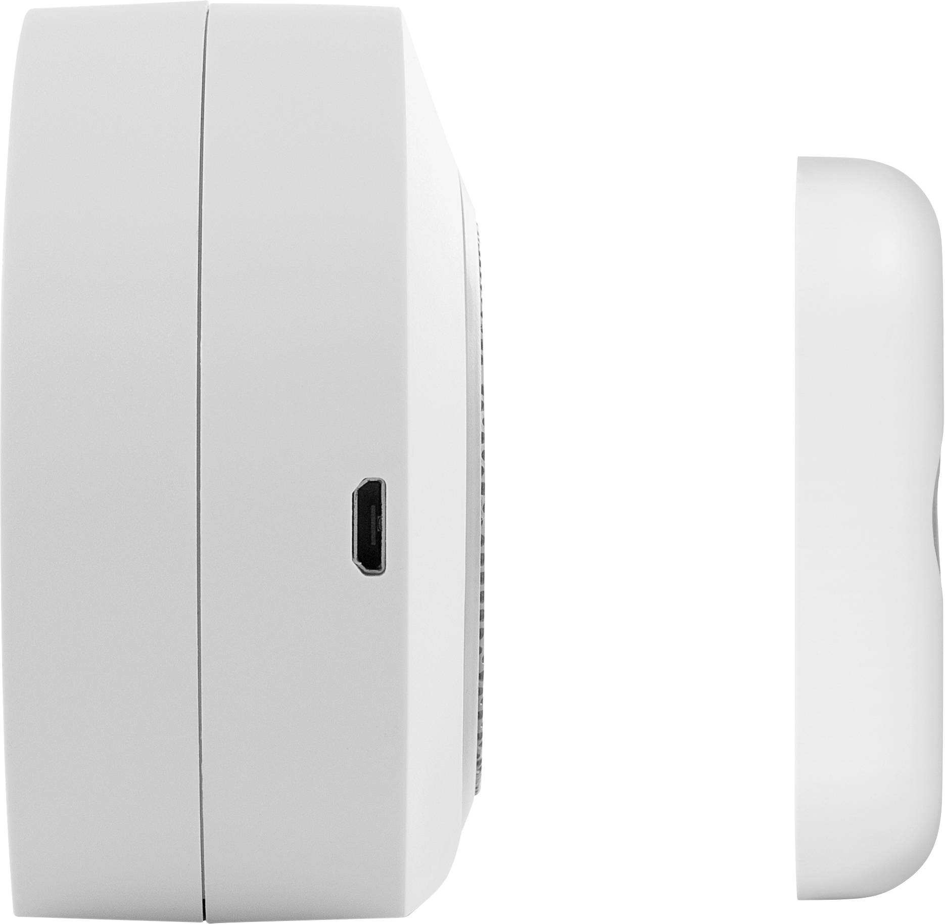 Vue latérale d'un appareil blanc et rond avec port USB.