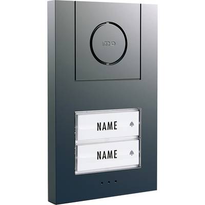 Panneau d'interphone avec deux plaques nominatives ; la partie supérieure comporte un bouton d'appel rond.