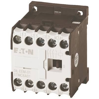 Un contacteur électrique portant l'inscription 'EATON', modèle 'DIL EEM-01 XTCMC6A01', présente des bornes pour connexions électriques.