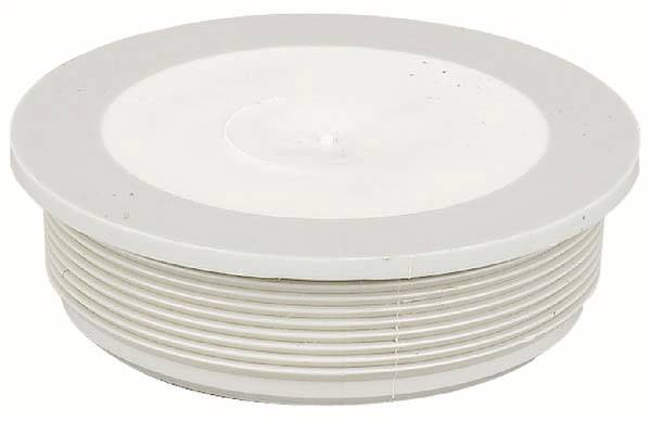 Un couvercle blanc rond avec un bord cannelé.