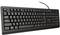 Un clavier d'ordinateur noir avec une disposition QWERTZ et un câble. En haut à droite se trouvent des touches de fonction supplémentaires et des voyants LED.