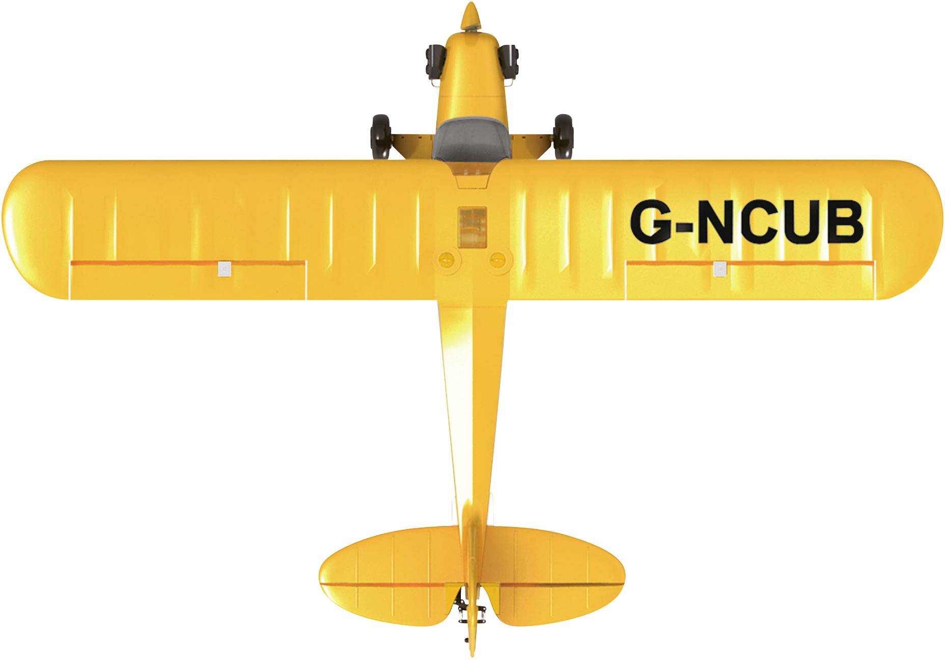 Un avion jouet jaune photographié de dessus, avec l'inscription 'G-NCUB' visible sur l'aile droite.