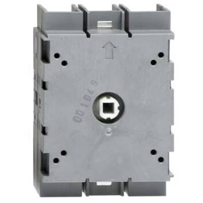 Un composant rectangulaire en plastique gris avec un raccordement concentrique et une marque fléchée, probablement un composant électrique.