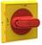 Bouton d'arrêt d'urgence jaune avec un levier rouge en position 'MARCHE'. Ce bouton est destiné à l'arrêt d'urgence des appareils.